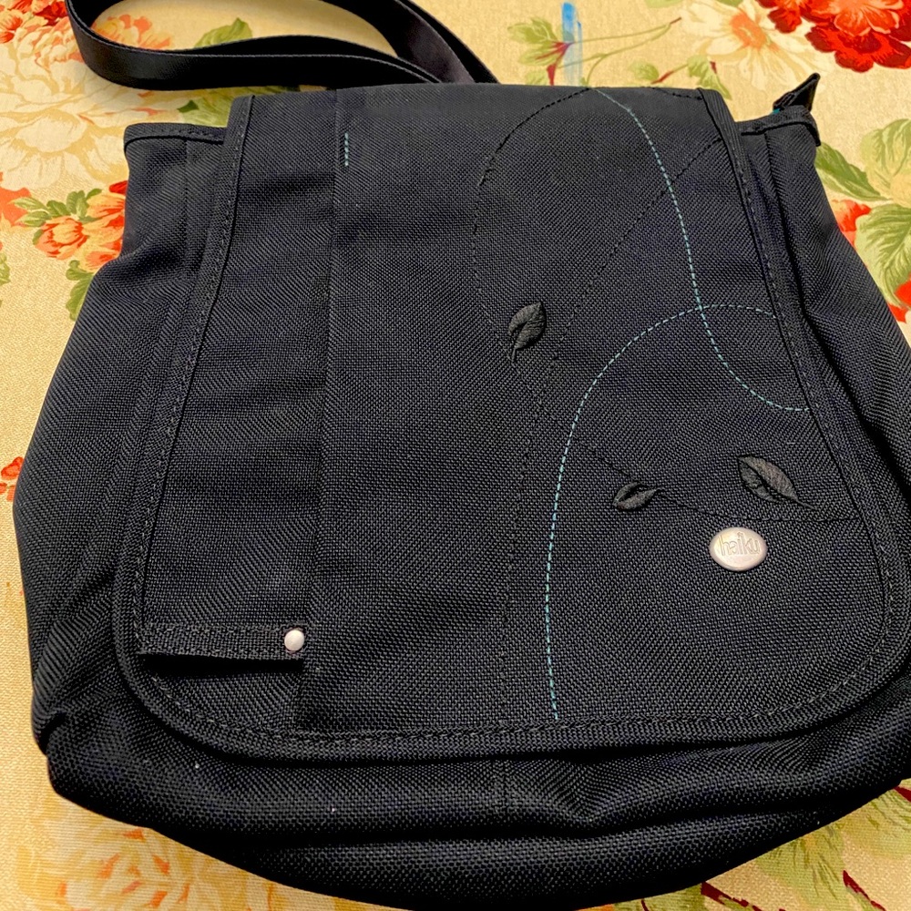 Haiku crossbody messenger bag with adjustable and convertible strap